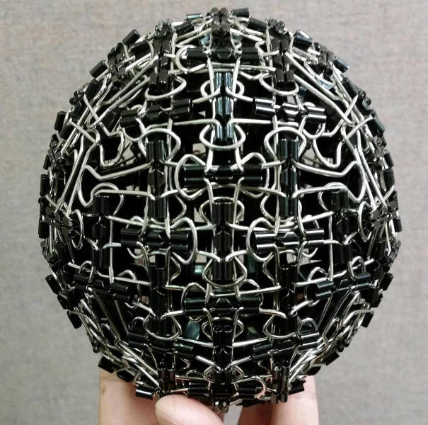 A ball made out of binder clips.