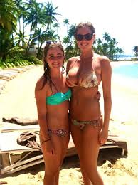 kate upton with fan on beach