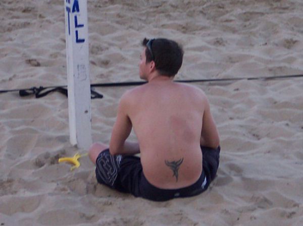 random pic tattoos on men on lower back