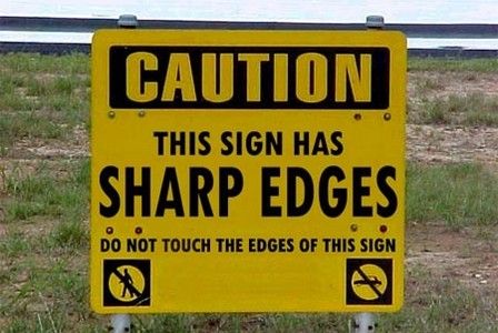 funny commercial signs - Caution Sharp Edges This Sign Has Do Not Touch The Edges Of This Sign