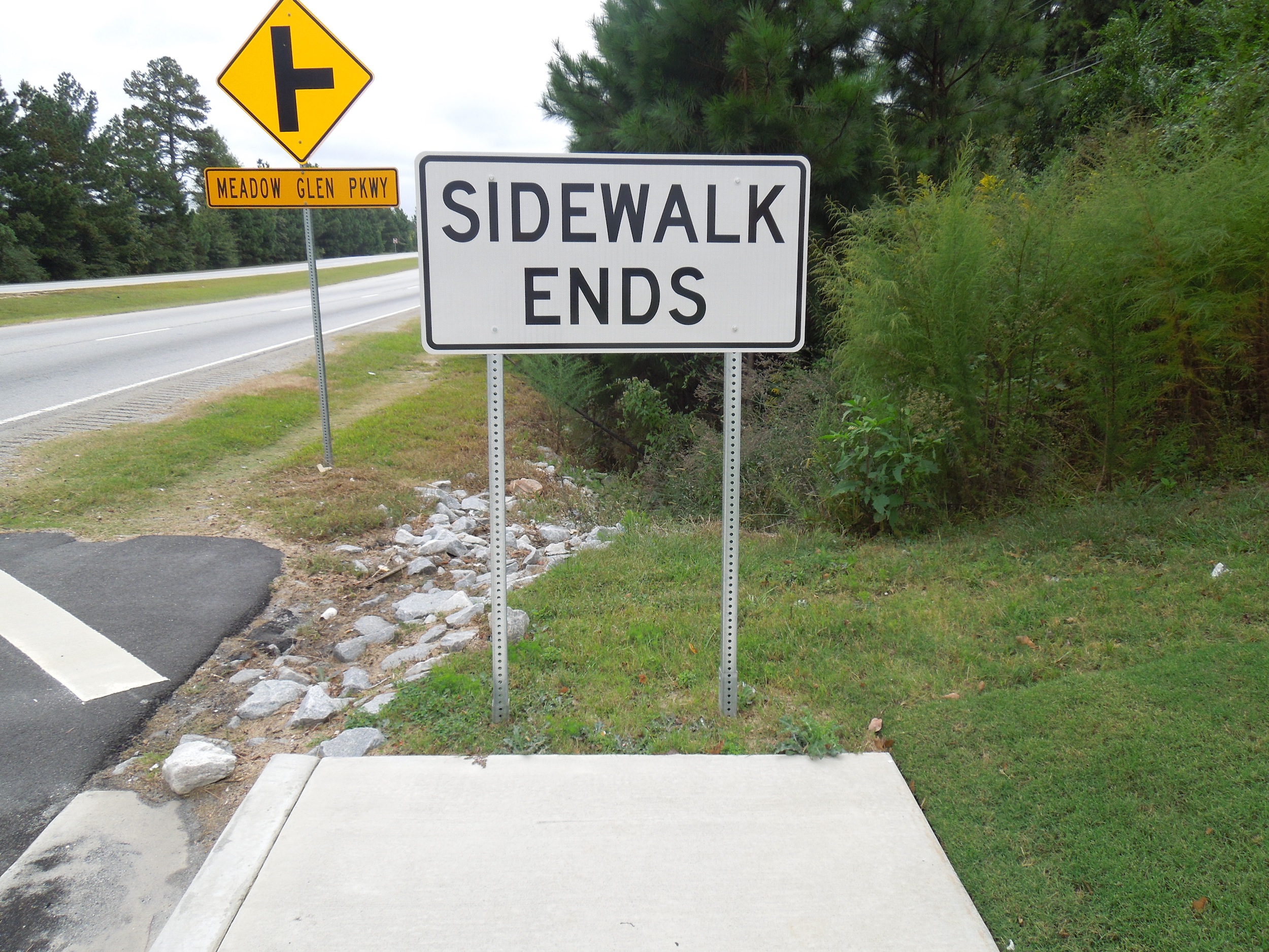 unnecessary sign - Meadow Glen Pkwy Sidewalk Ends