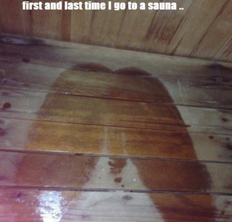 Funny picture of sweat marks in a sauna that seems to look like his junk was on the wood, with caption declaring he will never go into a sauna again