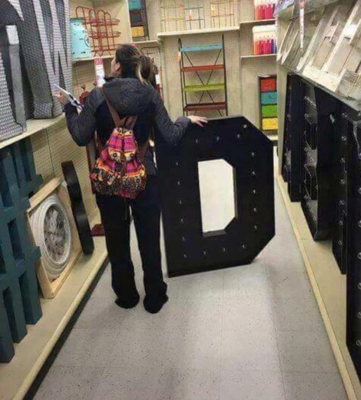 Funny picture of girl shopping for the D