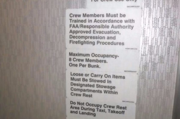 There's even a sign that pretty much gives away there's a room only meant for crew