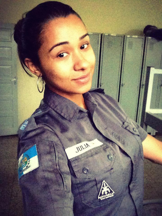 An extremely attractive officer in the Brazilian Military Police of Rio de Janeiro named Julia Liers recently arrested the leader of one of Brazil's most notorious gangs. Now, she has five nudie pics of her floating around the Internet thanks to gang members who are super pissed about their leader being incarcerated.
