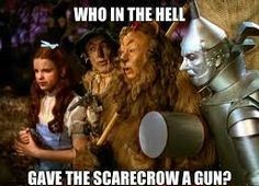 Mandela Effect - scarecrow has a gun - Who In The Hell Gave The Scarecrow A Gun?