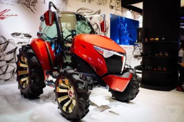Very futuristic looking farm tractor.