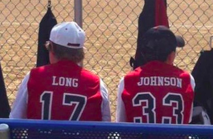 Funny picture of two players sitting next to each other, Long and Johnson.