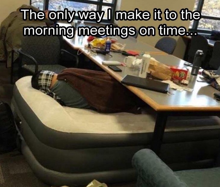 Funny meme about how the only way to make those early morning meetings is to sleep at the office, on an ice cream sandwich inflatable mattress.