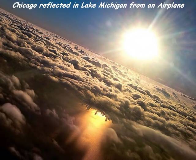 sunset lake michigan chicago - Chicago reflected in Lake Michigan from an Airplane
