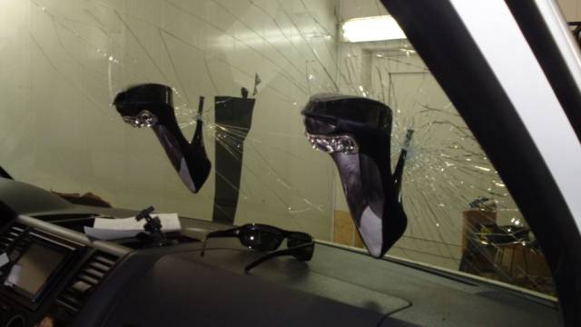 stupidity heels in windshield