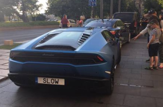 Lamborghini with a license plate SLOW
