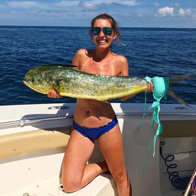 Girl holding a large fish