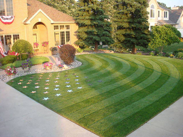 Awesome lawn that is of the American flag.