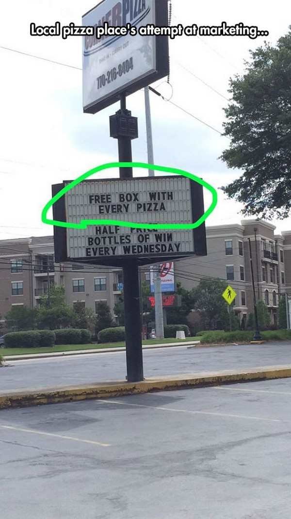 street sign - Local pizza place's attempt at marketing.co Free Box With Every Pizza Half Til Bottles Of Wim Every Wednesday