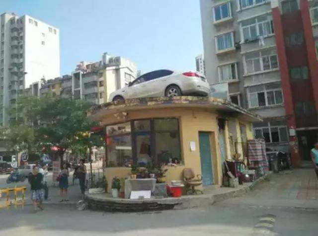 car on roof of building