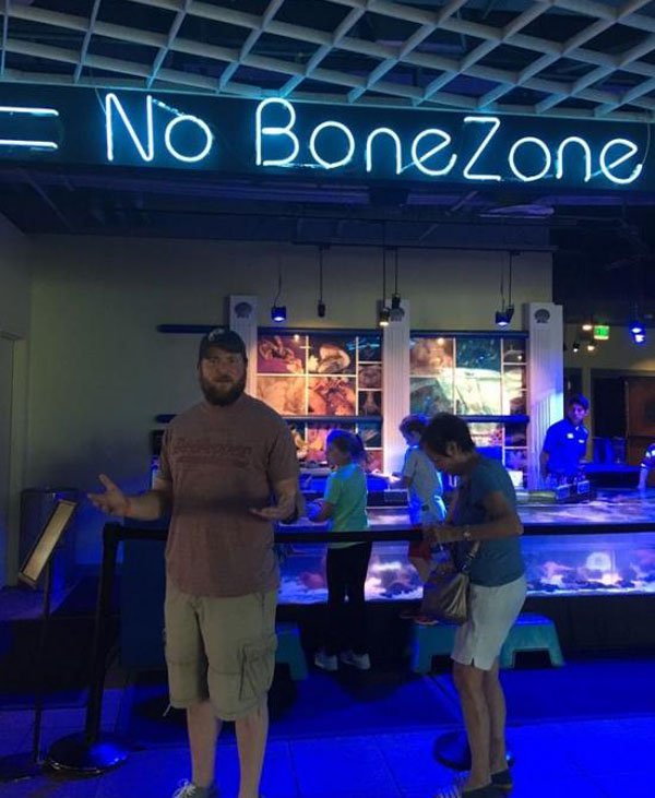 Man gestures at the No Bone Zone