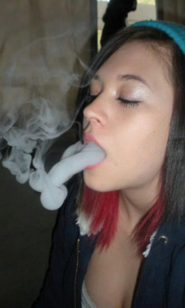 Girl blowing a cloud of smoke that looks like a penis balls abstract