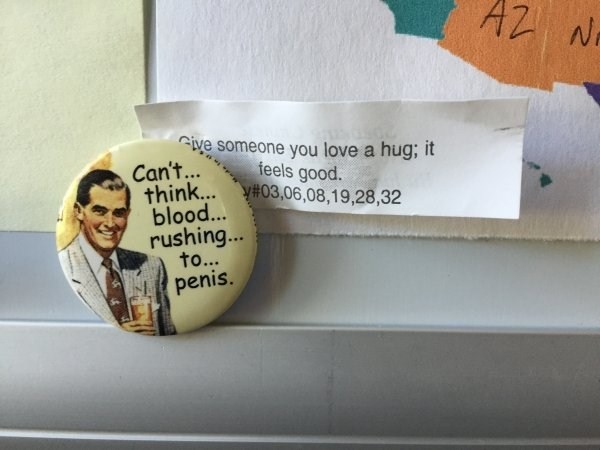 Funny button to put on a sign about hugs