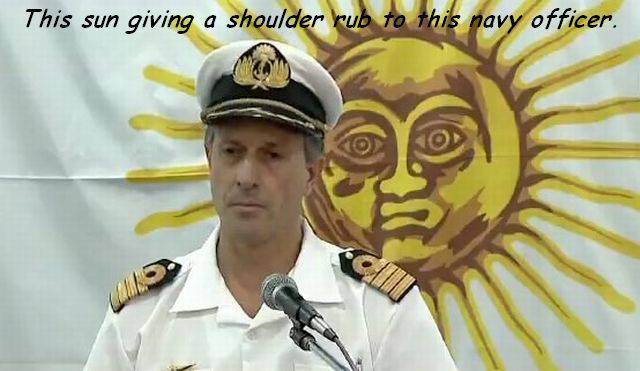 sun giving shoulder rub - This sun giving a shoulder rub to this navy officer.
