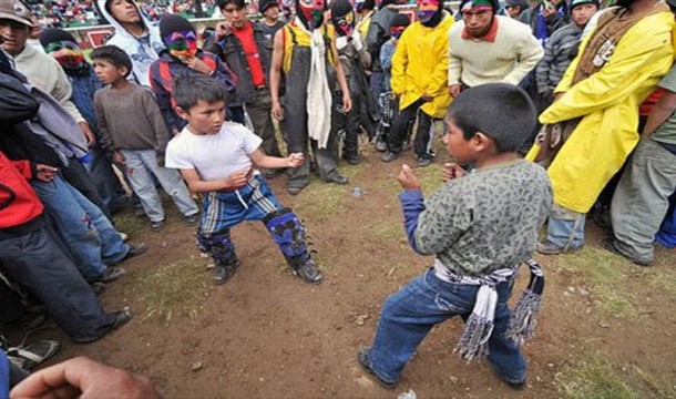 There is a village in Peru where people settle the previous year's grudges by fist fighting. They then start the new year off on a clean slate