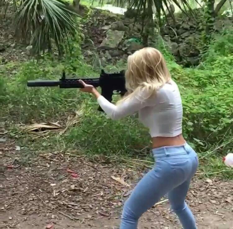 sexy girl shooting gun