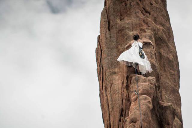 fun photo rock climbing bride