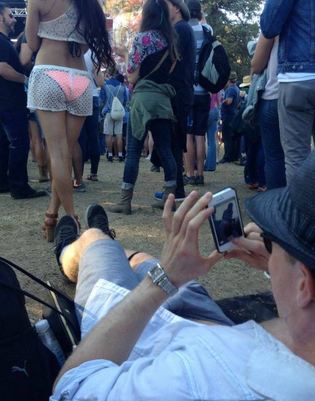guy taking a pic of a woman