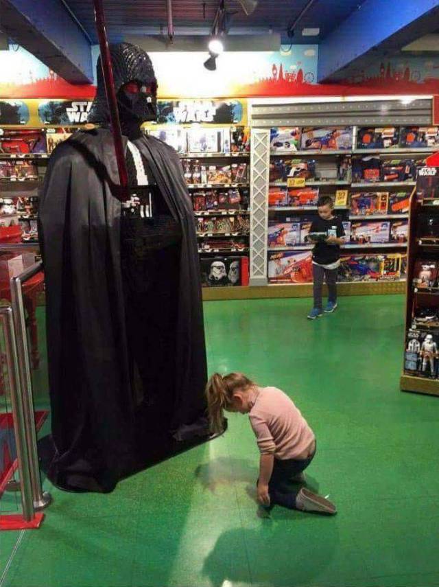 kid bowing to darth vader