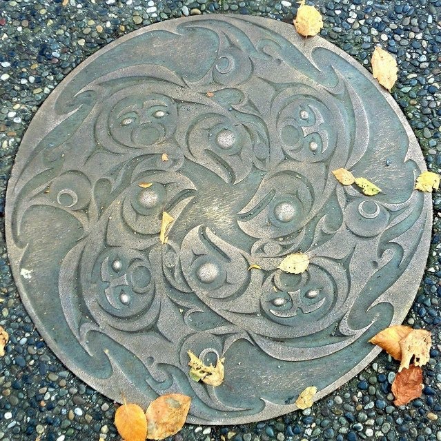 This beautiful manhole cover is in Vancouver, BC.