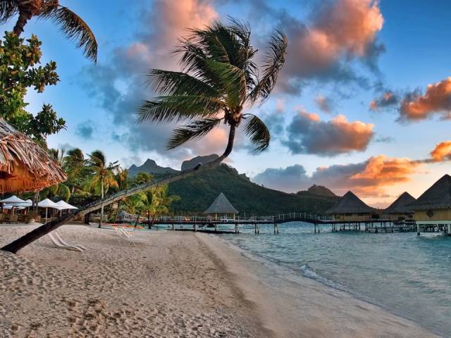Matira Beach, Bora Bora, French Polynesia-One of the very few beaches that are open to the public in Bora Bora, Matira Beach is home to a turquoise-colored lagoon, palm trees galore, and powder-soft sand. What more could you want?