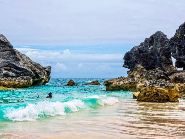 Horseshoe Bay, Bermuda-Horseshoe Bay's Port Royal Cove is lesser known among tourists than Horseshoe Bay itself. It's a great little spot for snorkeling thanks to shallow waters, and the surrounding rock formations are stunning.