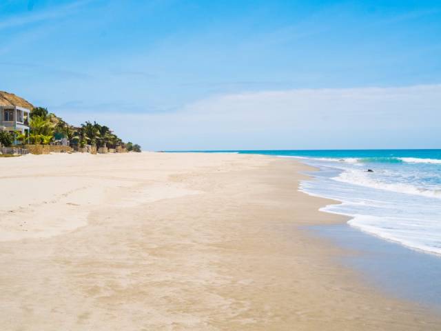 Máncora Beach, Máncora, Peru-Popular among surfers thank to its large waves, Máncora Beach sits along Peru's northwestern coast. When visitors are done at the beach, they can head to Avenida Piura, the main drag in town, which is home to plenty of restaurants, bars, and cafes.