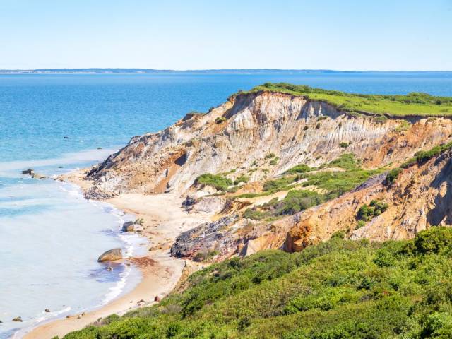 Gay Head Beach, Aquinnah, Massachusetts-Situated on the south side of Martha's Vineyard, Gay Head is particularly striking because of the magnificent cliffs that tower over the beach. The name Gay Head refers to the bright colors of the cliffs.