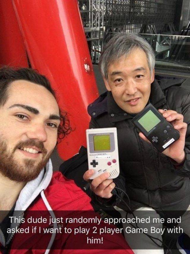 guy playing gameboy - 25 Mans This dude just randomly approached me and asked if I want to play 2 player Game Boy with him!