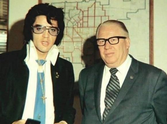 Elvis receiving an honorary police badge in Colorado back in 1970.