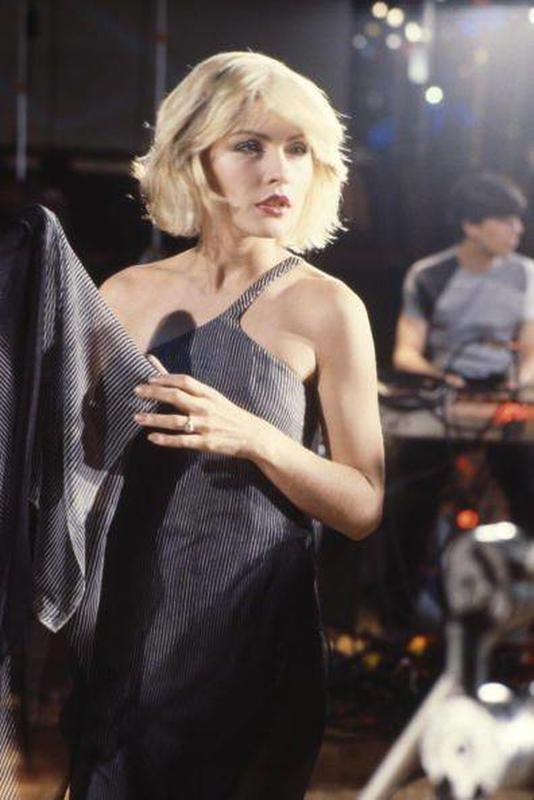 Here's Debbie Harry of Blondie on the set of the 'Heart of Glass' video shoot. According to the group, the song wasn't actually about anyone, in particular, just a general moan about lost love. Originally the song said: "Once I had a love, it was a gas. Soon turned out, it was a pain in the ass." As Harry later explained, "We couldn't keep saying that, so we came up with: "Soon turned out, had a heart of glass." We kept one "pain in the ass" in – and the BBC bleeped it out for radio."