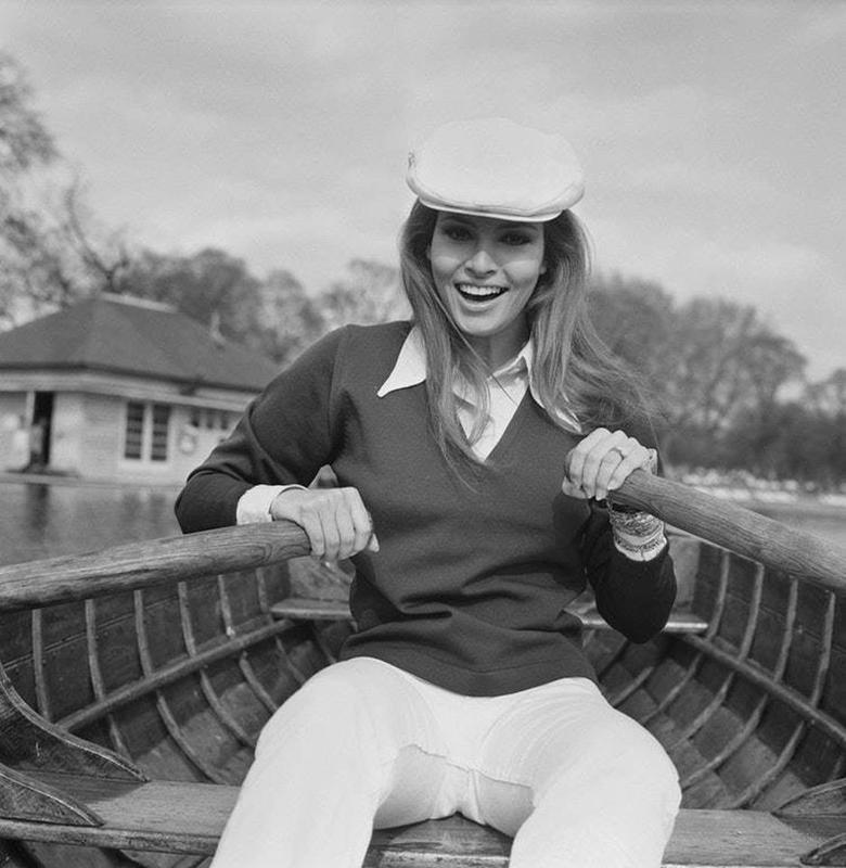 'Dream boat' Raquel Welch rowing a boat on a lake in London, 1969.