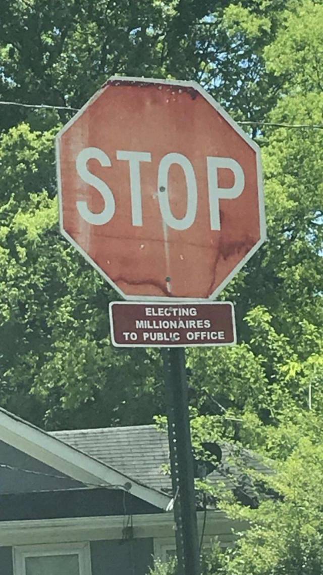 street sign - Stop Electing Millionaires To Public Office