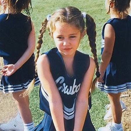 Cheerleader Miley Cyrus
