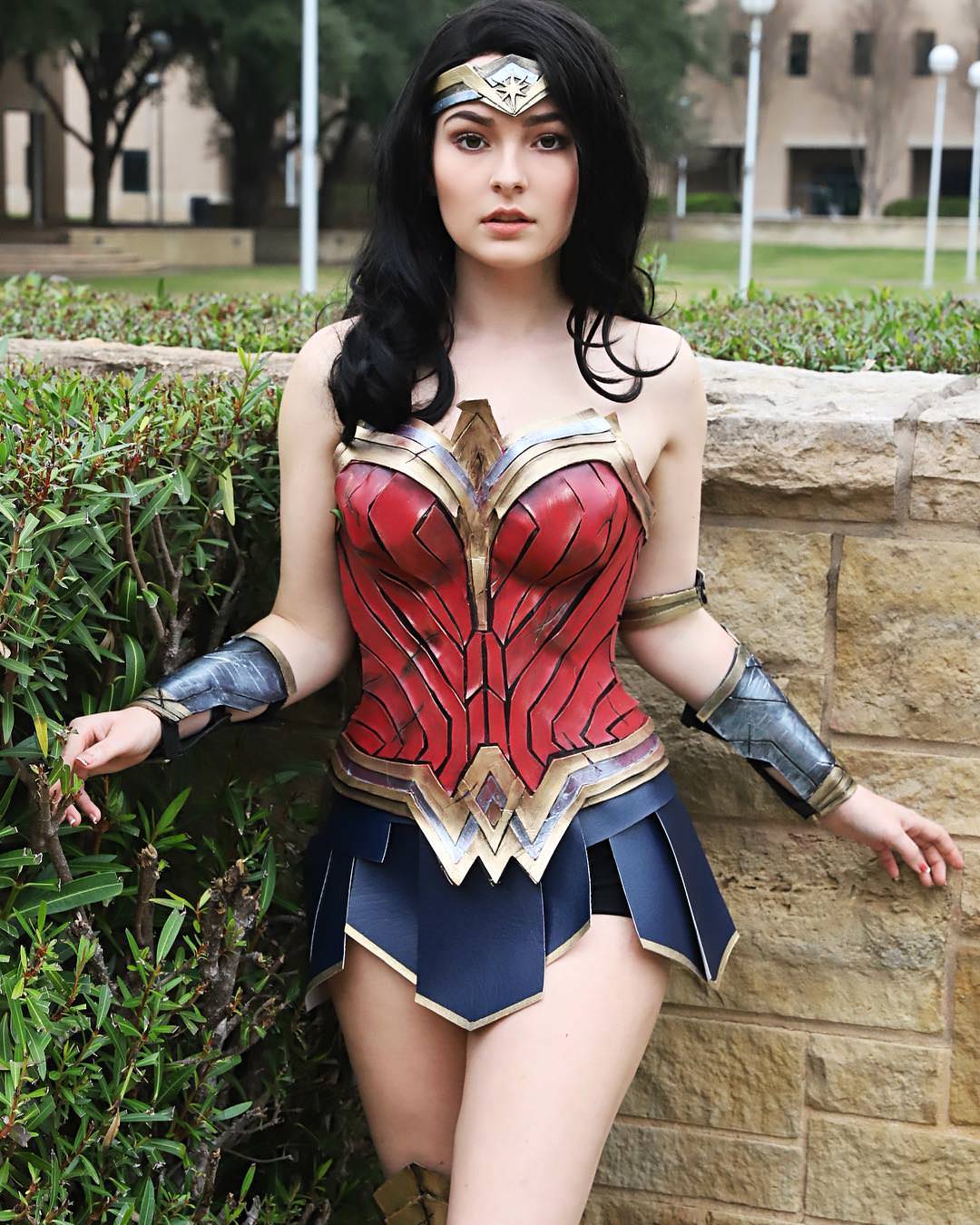a sexy brunette in wonder woman cosplay