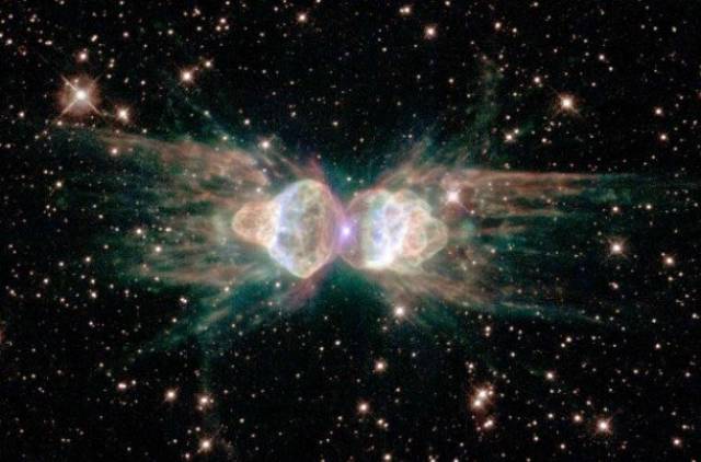 Ant Nebula-Resembling the body of an ant, what you are looking at is actually a star in process of dying. Those jets of gas being shot out into space are actually moving at about 620 miles per second. Don’t worry though, the nebula is located approximately 8,000 light years from Earth (from left to right the image above spans a length of about 1 light year)