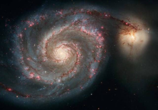 Whirlpool Galaxy-What has become a classic picture of deep space, the Whirlpool Galaxy is actually visible from Earth if you can get your hands on some quality binoculars. It is believed to spiral the way it does due to the gravitational disturbance caused by the dwarf galaxy in the upper right.