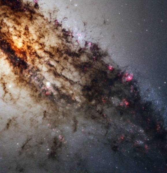 Centaurus A-This image of Centaurus A using the most advanced instrument on the Hubble Space Telescope, Wide Field Camera 3, reveals previously concealed portions of this spectacular galaxy.