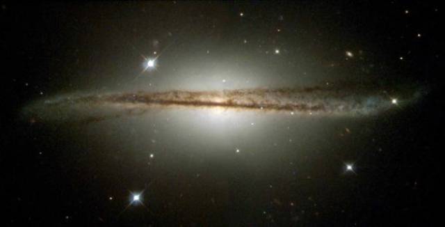 The Edge-On Galaxy-Technically named ESO 510-G13, this image gives you an idea of what a spiral galaxy like ours looks like when captured edge-on.