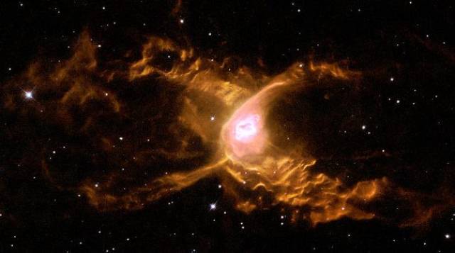 The Red Spider Nebula-This extremely warm nebula is home to one of the hottest known stars in the universe, and it generates stellar winds with waves over 100 billion km high.