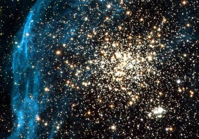 The Double Cluster-Found in the Large Magellanic cloud, one of the closest galaxies to the Milky Way, this crowded cluster of young stars gives us a look into the intensity of the star formation process.