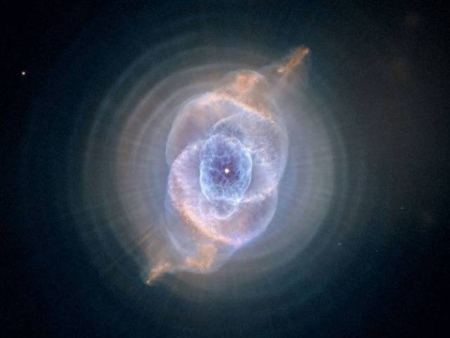 Cat's Eye Nebula-As the first planetary nebula to be discovered in the night sky, the Cat’s Eye is also one of the most complex. These type of nebulae occur when dying stars eject their gaseous outer layers into space.