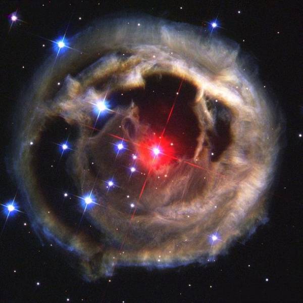 V838 Monocerotis-In 2002, the star V838 Monocerotis suddenly became 600,000 times brighter than the Sun. In fact, for a few weeks, it was the brightest object in our galaxy. Moreover, due to something known as a light echo illuminating its surrounding rings of gas, the star appeared to be expanding rapidly as well, making it one bizarre star. It has since died down, however, and astronomers are still not sure what caused the outburst.