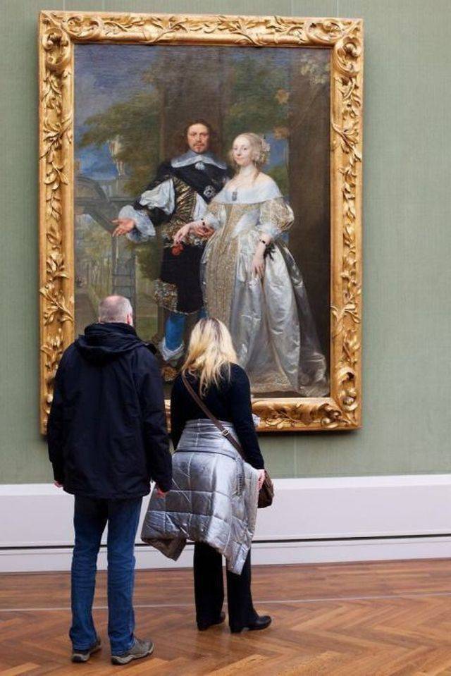 people looking at art in museum